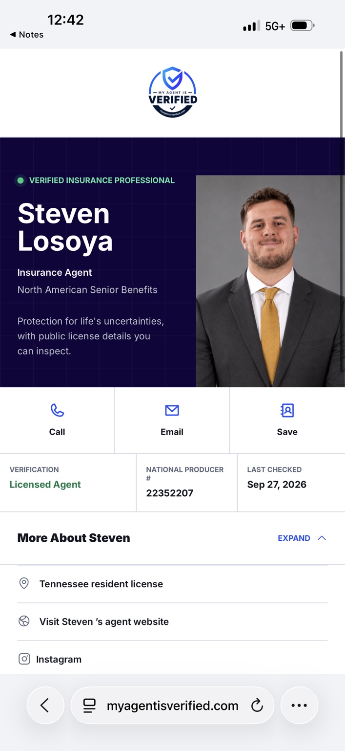 Steven Losoya wearing a dark suit and gold tie